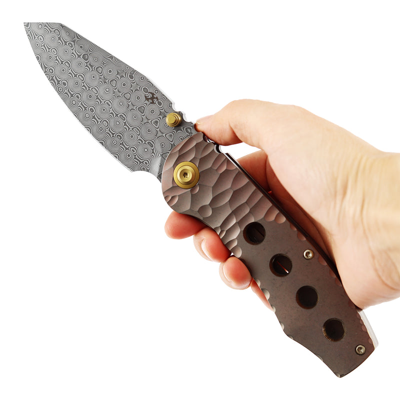 Kansept Caveman | Frame Lock | Rose Gold Anodized and Stonewashed Titanium with CNC-machined Rock Pattern | 3.57" Damascus Blade |  Jesse Pauley Designed | K1110A6