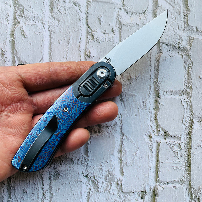 Reverie K2025A4 Black anodized Titanium Bolster + Timascus Scales Handle CPM-S35VN Blade with  Justin Lundquist Design