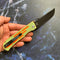 Reedus T1041A3 Black TiCn Coated and Stonewashed 154CM Blade Green and Orange G10 Handle with D.O.C.K. Design